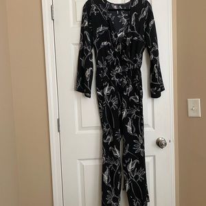 Black and white floral and moon patterned long sleeve jumpsuit
